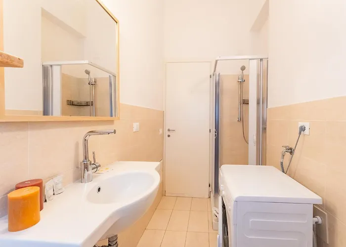 Complex Surrounded By Greenery With Pool *