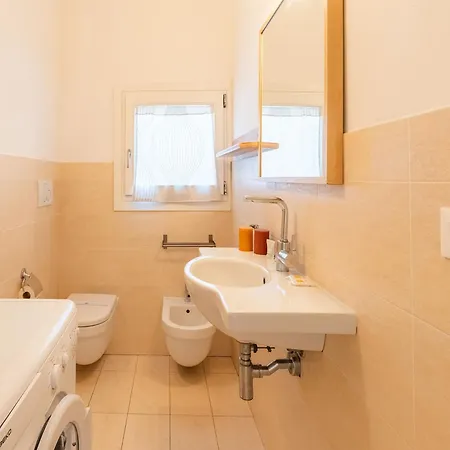 Complex Surrounded By Greenery With Pool *