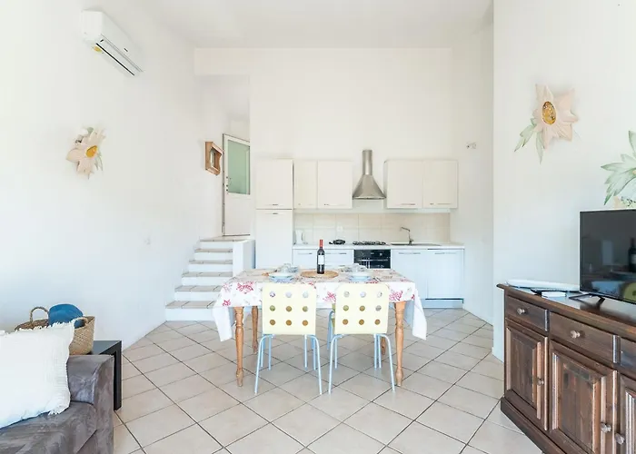 Complex Surrounded By Greenery With Pool *